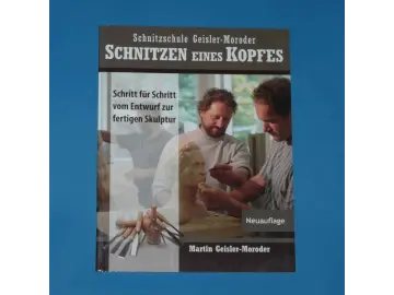 Buch Schnitzen eines Kopfes